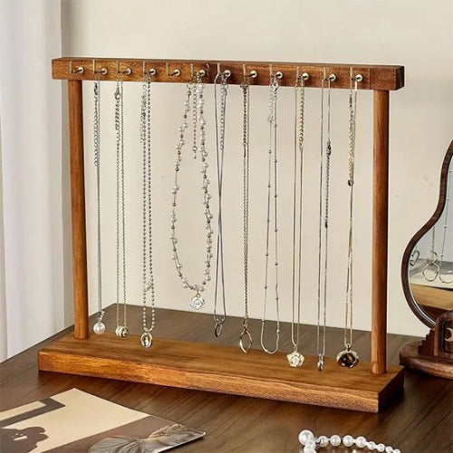 Porte bijoux en bois massif sur table
